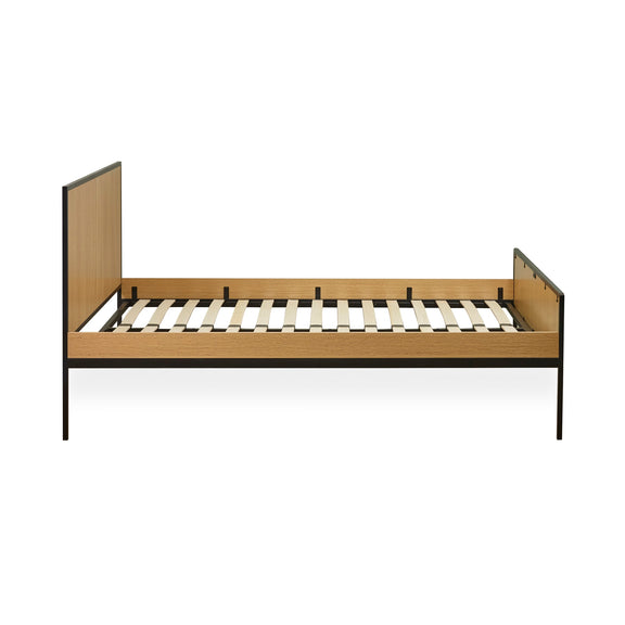 Wooden bed frame with metal legs on a white background
