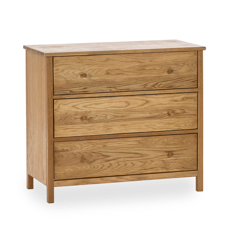 Wooden dresser with three drawers on a white background