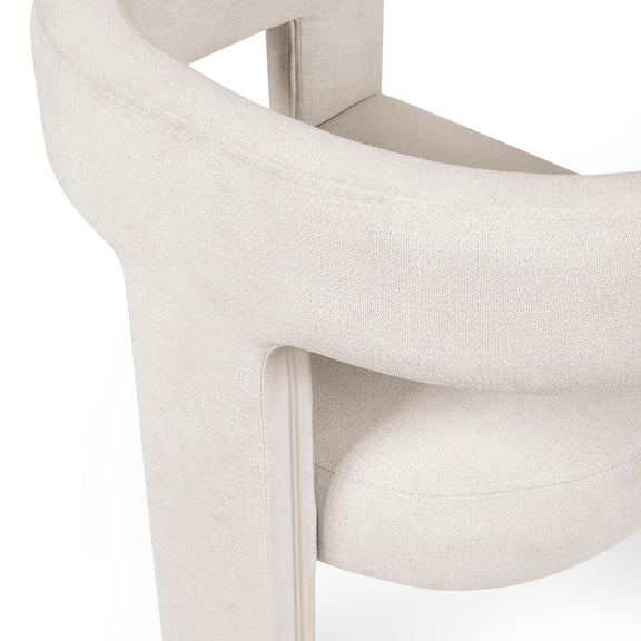 Close-up of a white chair with a neutral background