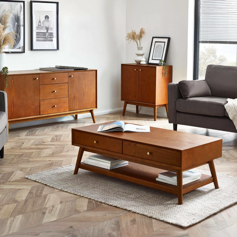Living room with wooden coffee table, sideboard, and gray sofa.