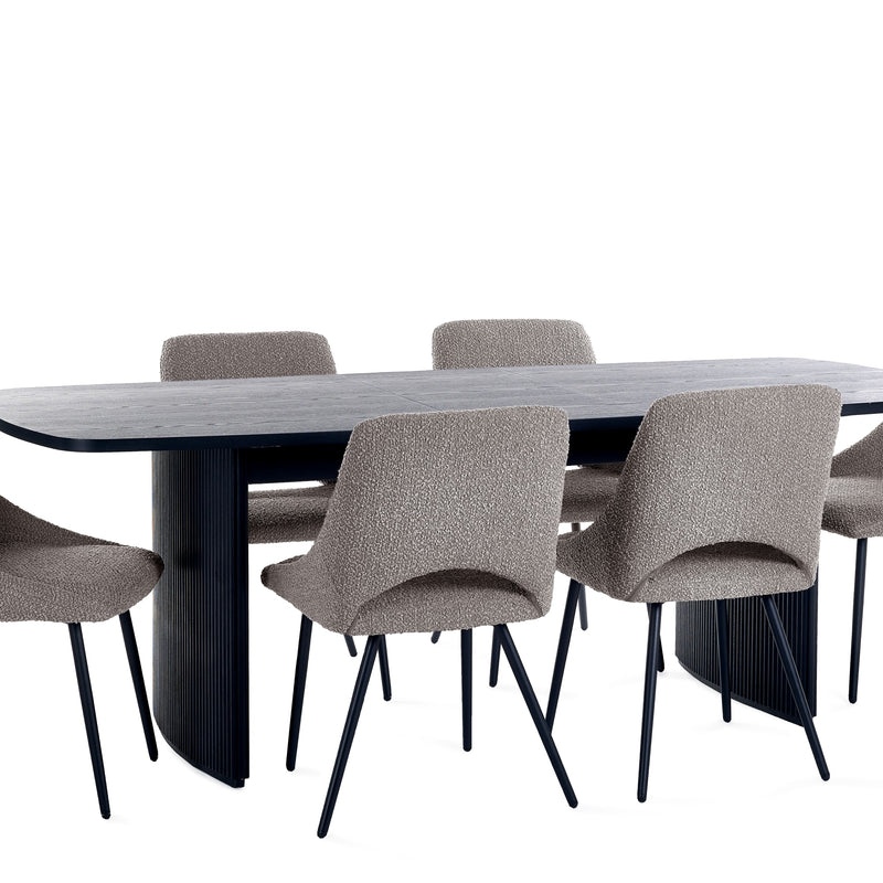 Dining table with six chairs on a white background
