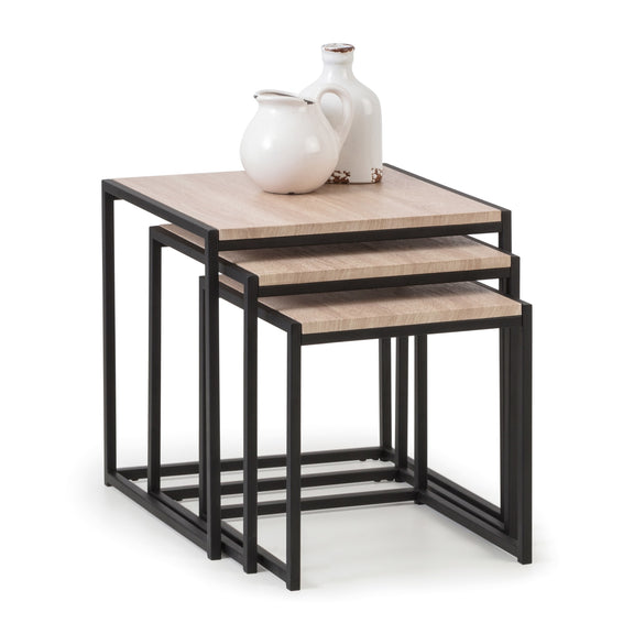 Set of three nesting tables with black metal frames and wooden surfaces, featuring two ceramic vases on top.