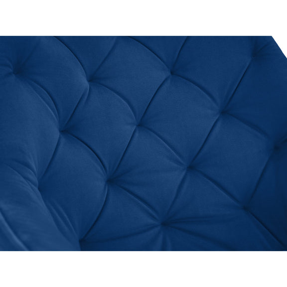 Close-up of a blue tufted cushion on a white background