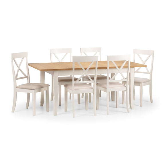 Dining table set with six chairs on a white background
