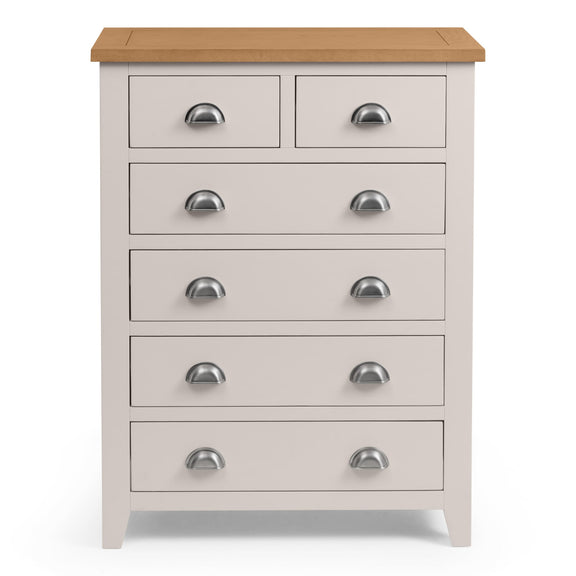 White dresser with five drawers and a wooden top on a white background