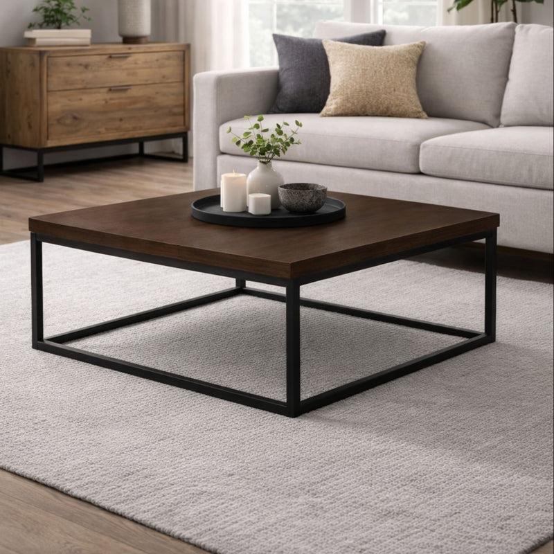 Wooden coffee table with decorative items in a living room setting