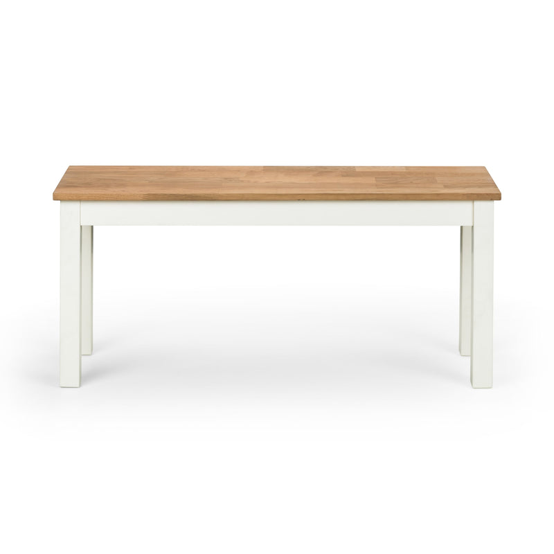 Dining table with wooden top and white base on a white background