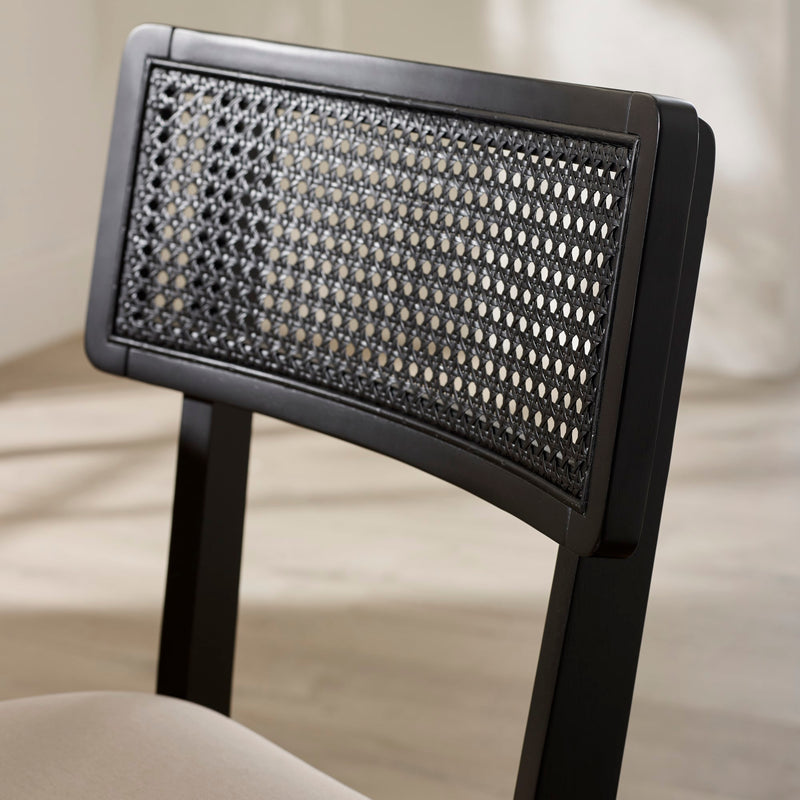 Black headrest with textured surface on a blurred background
