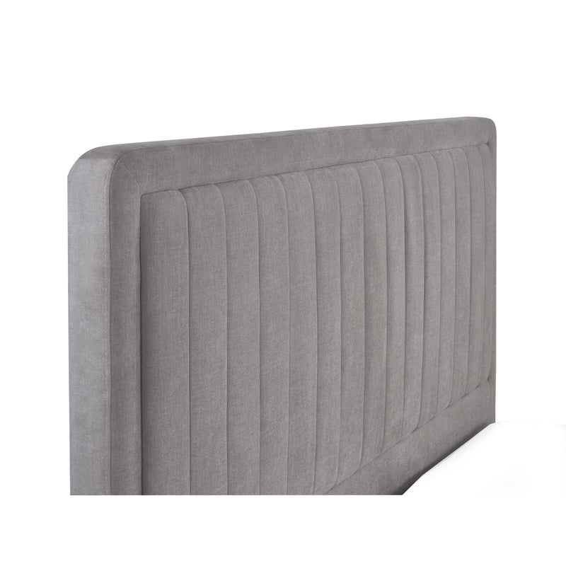 Gray upholstered headboard with a ribbed texture on a white background
