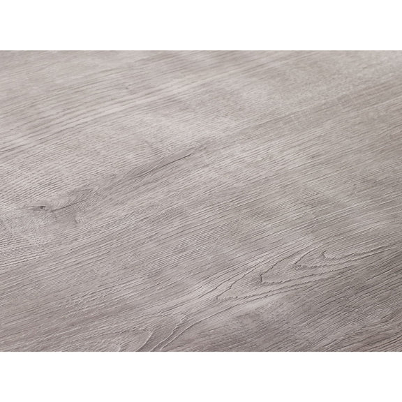 Close-up of a gray wooden surface with visible grain and texture.