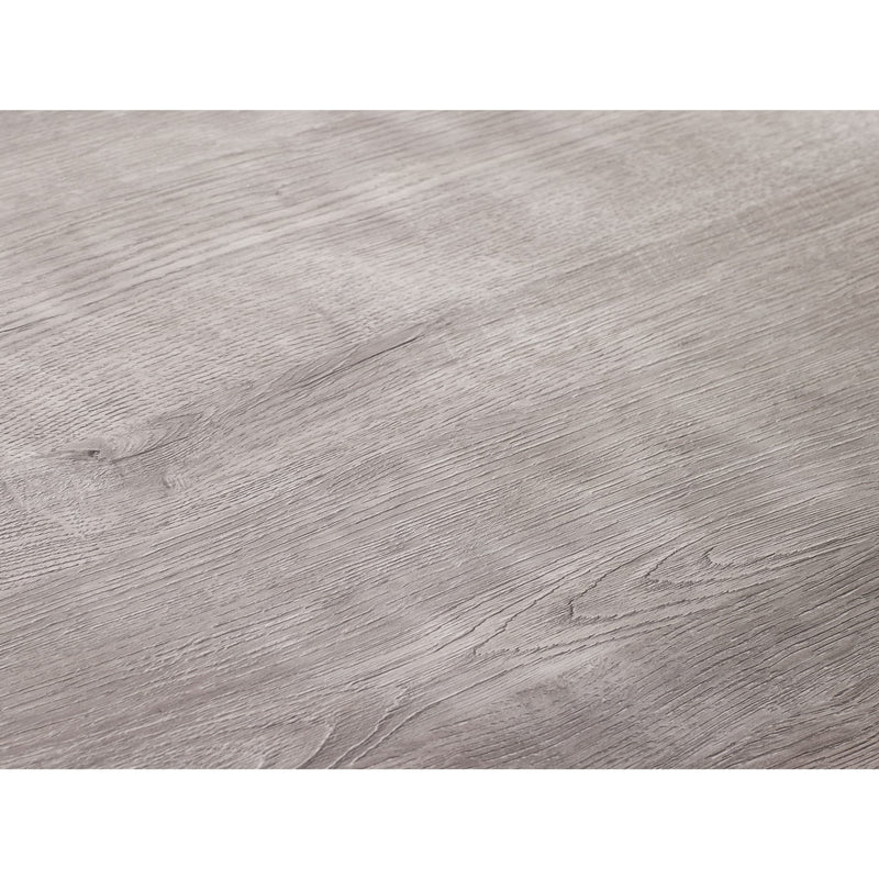 Close-up of a gray wooden surface with visible grain and texture.
