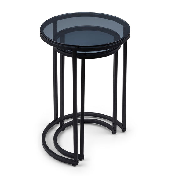 Black metal side table with smoked glass top on a white background