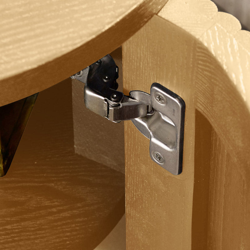 Close-up of a wooden furniture piece with a metal hinge.