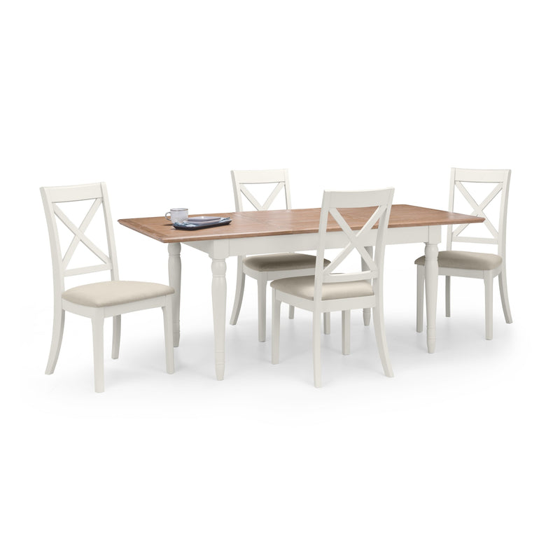 Dining table set with four chairs on a white background