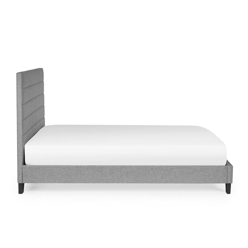 Gray upholstered bed with white mattress on a white background