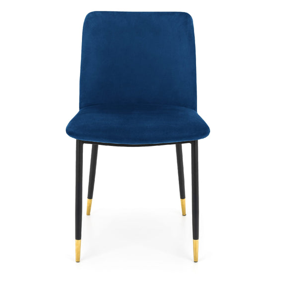 Blue velvet chair with black legs and gold accents on a white background