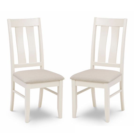 Two white chairs with beige seats on a white background