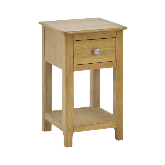 Wooden side table with a drawer on a white background