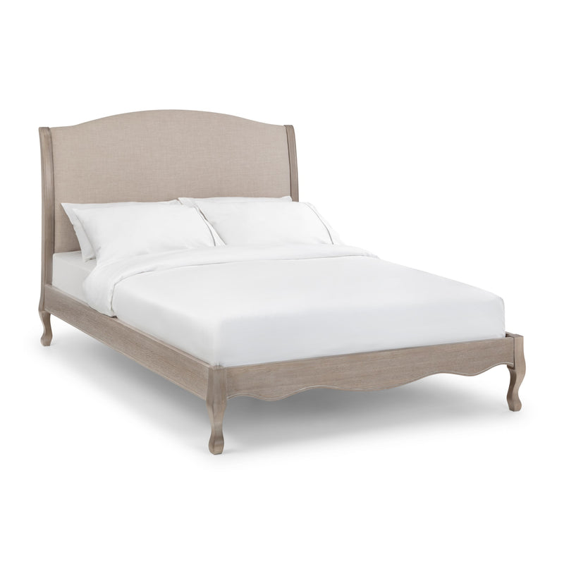 Beige bed frame with white bedding on a white background