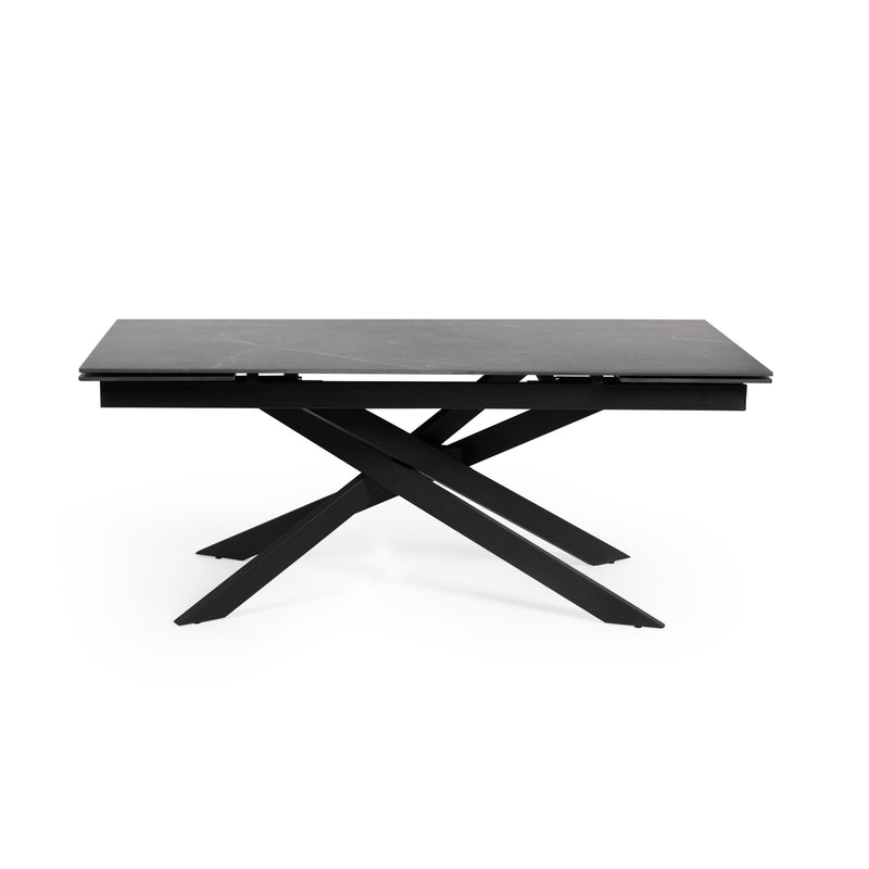 Black dining table with X-shaped legs on a white background