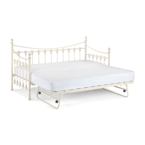 White metal bed frame with a mattress on a white background