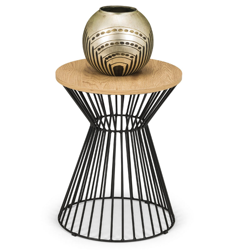 Small round wooden table with black wireframe base and decorative vase on a white background