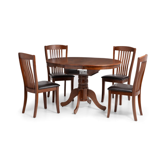 Wooden dining table with four matching chairs on a white background