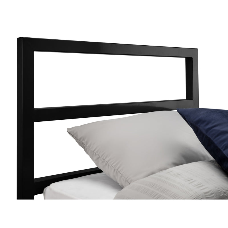 Black metal headboard with pillows on a white background