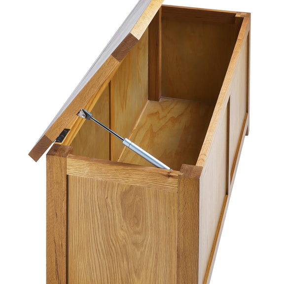 Wooden storage box with a tool inside on a white background