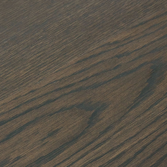 Close-up of a dark brown wooden surface with visible grain.