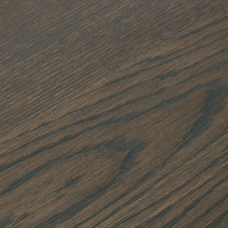 Close-up of a dark brown wooden surface with visible grain.