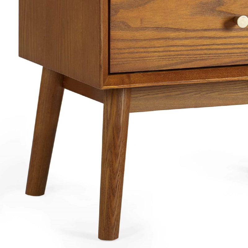 Close-up of a wooden cabinet with a white background