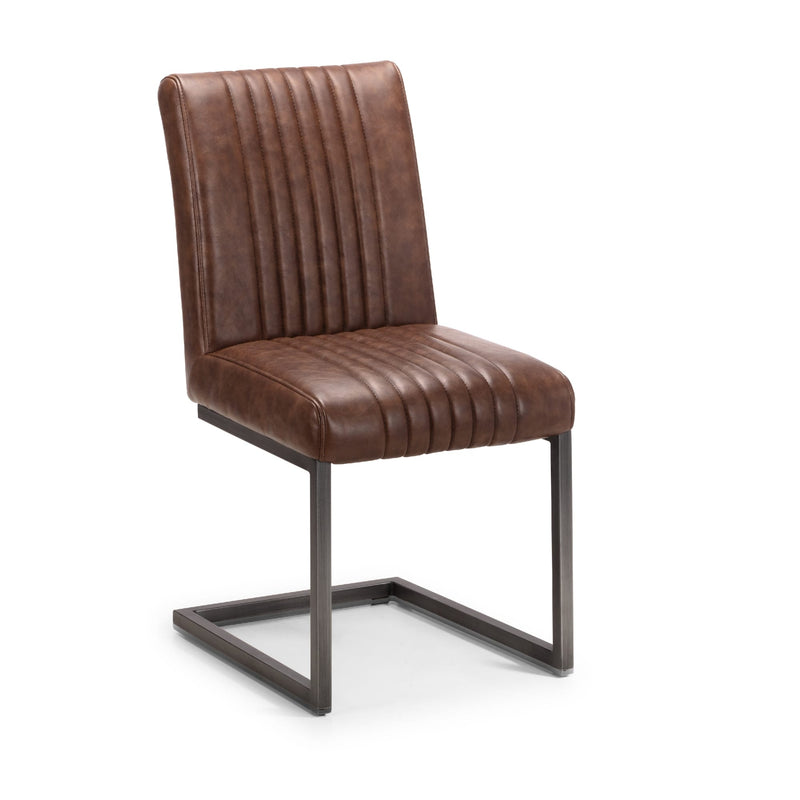 Brown leather chair with metal legs on a white background