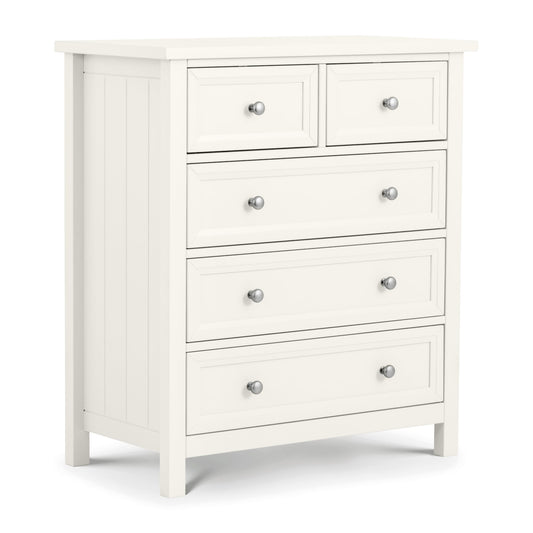 White dresser with multiple drawers and silver knobs on a white background