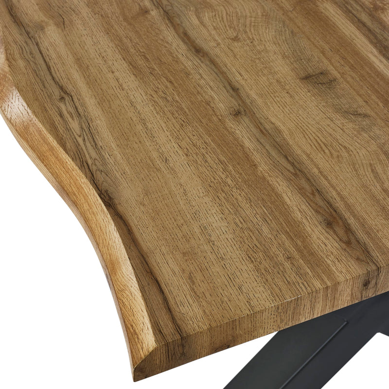Close-up of a wooden table surface with a natural finish