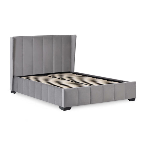 Gray upholstered bed frame on a white background