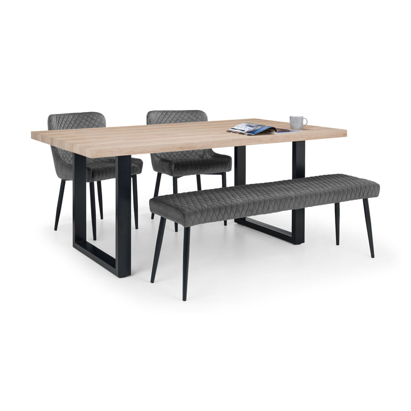 Dining table set with chairs and a bench on a white background