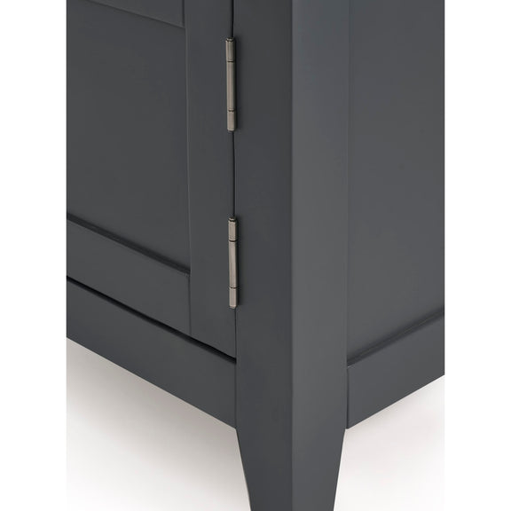 Dark gray cabinet with a visible hinge on a white background