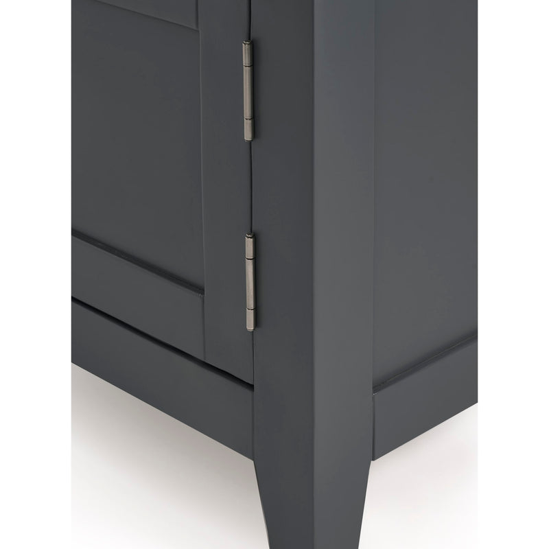 Dark gray cabinet with a visible hinge on a white background