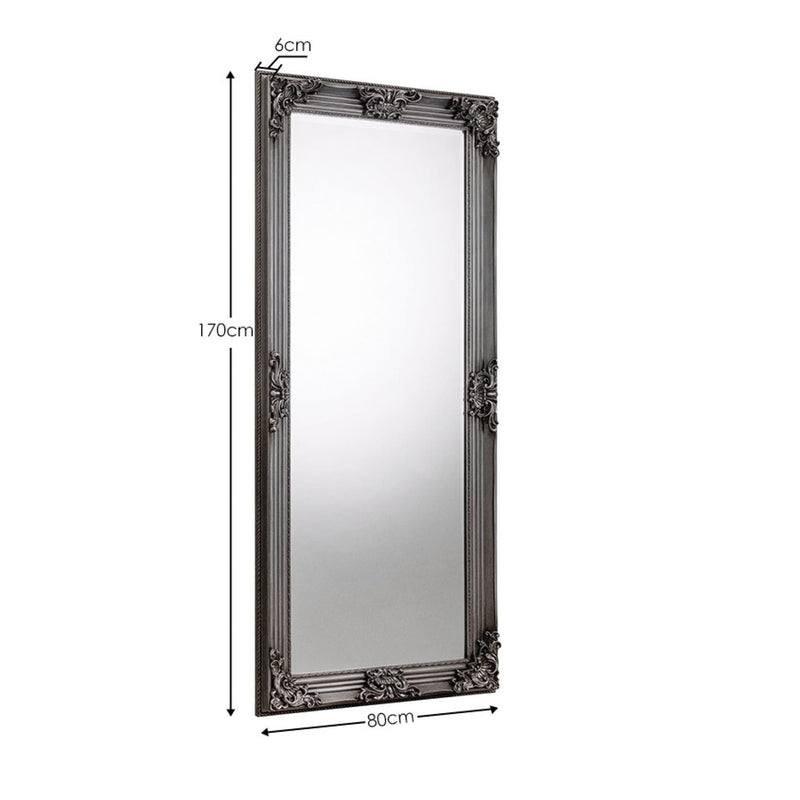 Decorative mirror with ornate frame and measurement details on a white background
