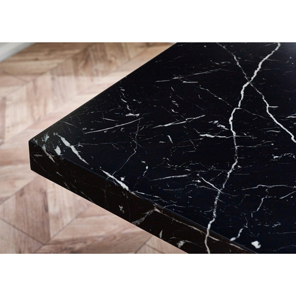Black marble countertop on a wooden floor