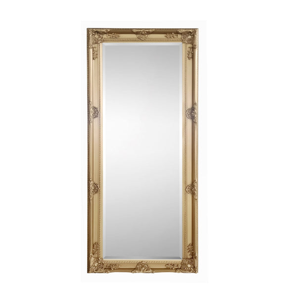 Decorative gold-framed mirror on a white background