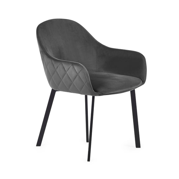 Dark gray armchair with quilted backrest on a white background