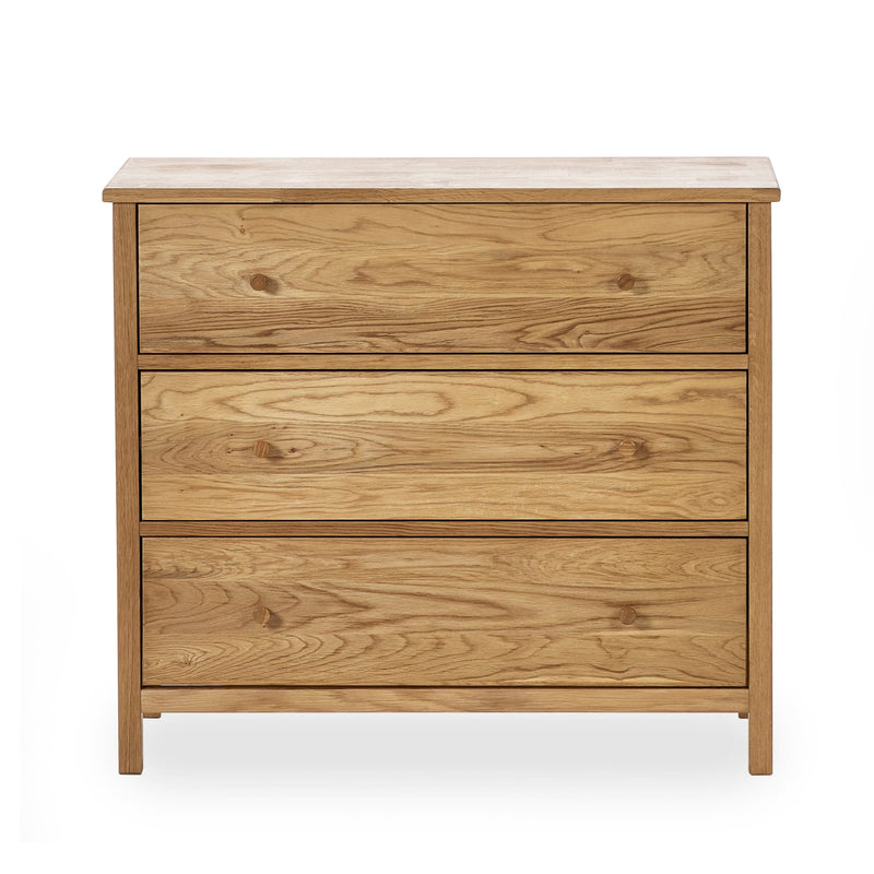Wooden dresser with three drawers on a white background