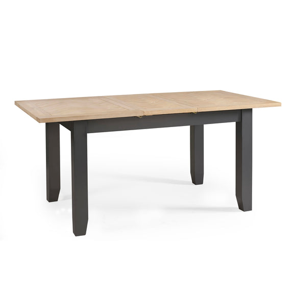 Rectangular table with black legs and a light wood top on a white background