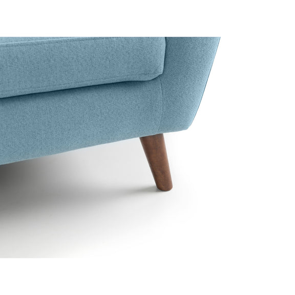 Blue sofa with wooden leg on a white background