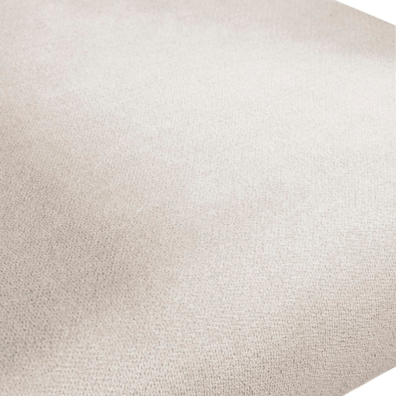 Close-up of a textured beige fabric surface