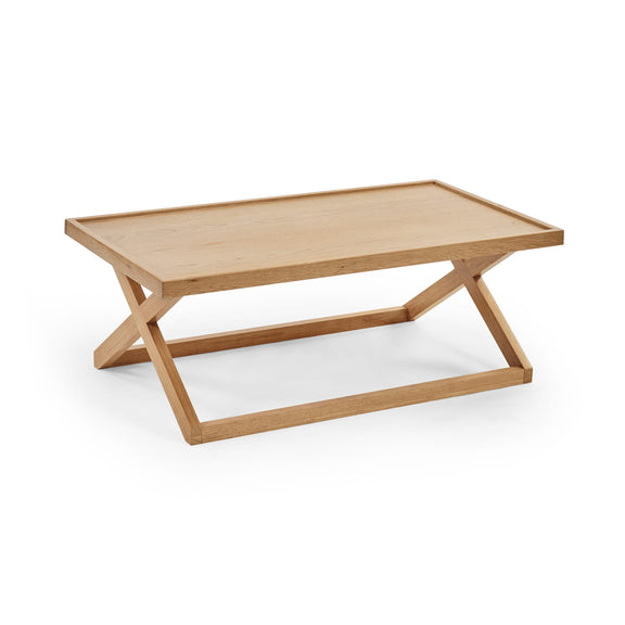 Wooden coffee table with a minimalist design on a white background