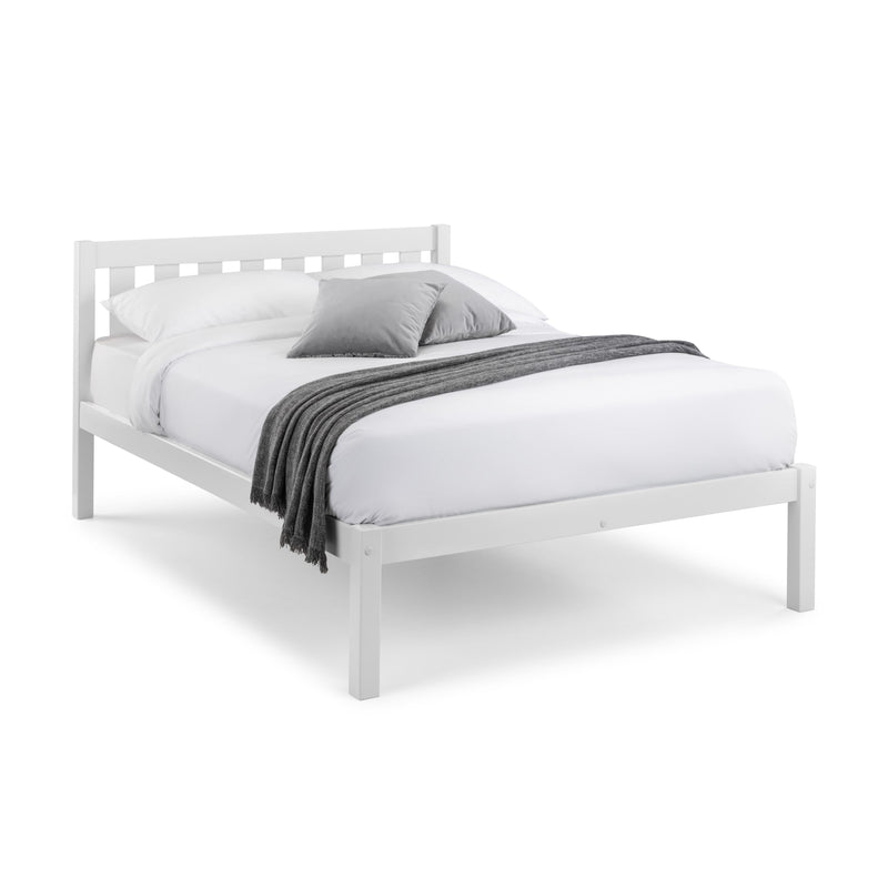 White bed frame with gray bedding on a white background