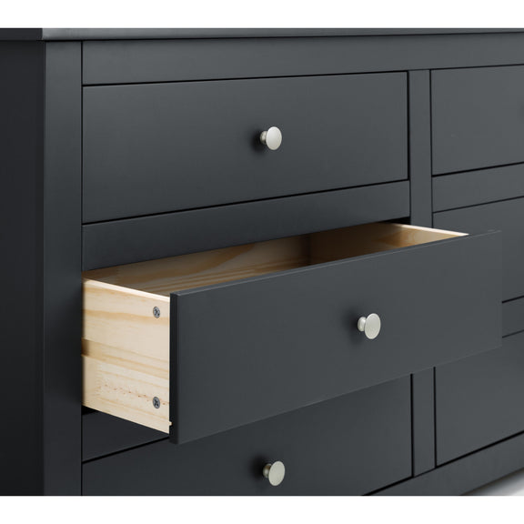 Black dresser with open drawer revealing wooden interior